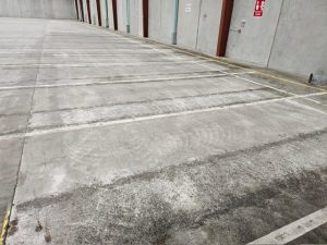 Damaged concrete floor during